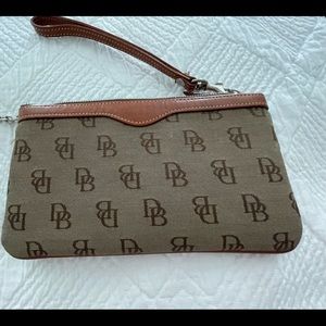Dooney & Burke wristlet NWOT. Never used